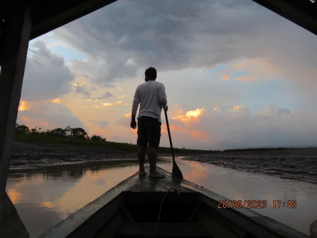 Sunset over the Amazon River after a day of sport fishing