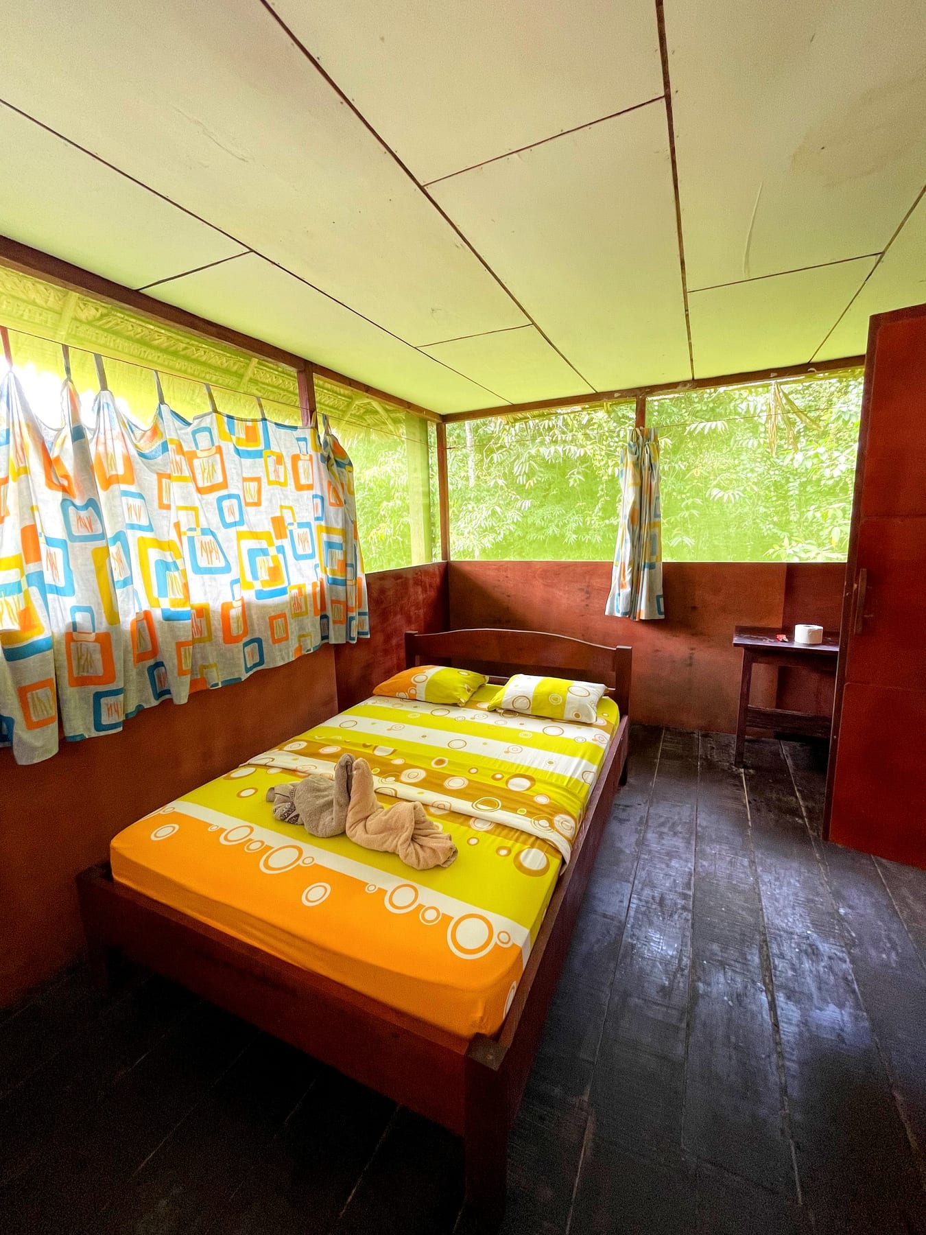 Private bungalow bedroom with full bed at Brisa Tropical Eco-Lodge